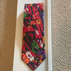 Vintage Nicole Miller 100% Silk tie. Basketball themed.
